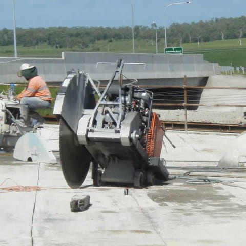 Floor sawing bridge for removal