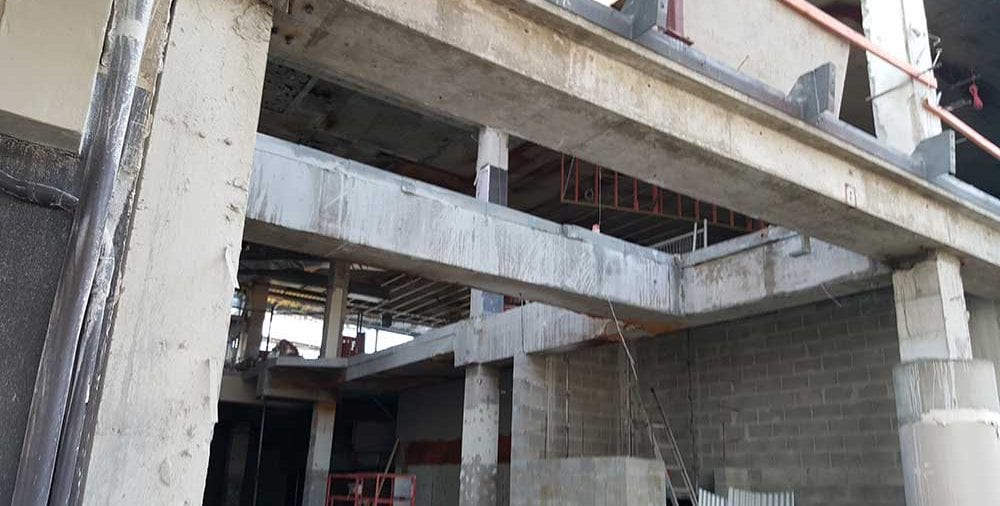 Suspend floors and concrete beams saw cut for removal